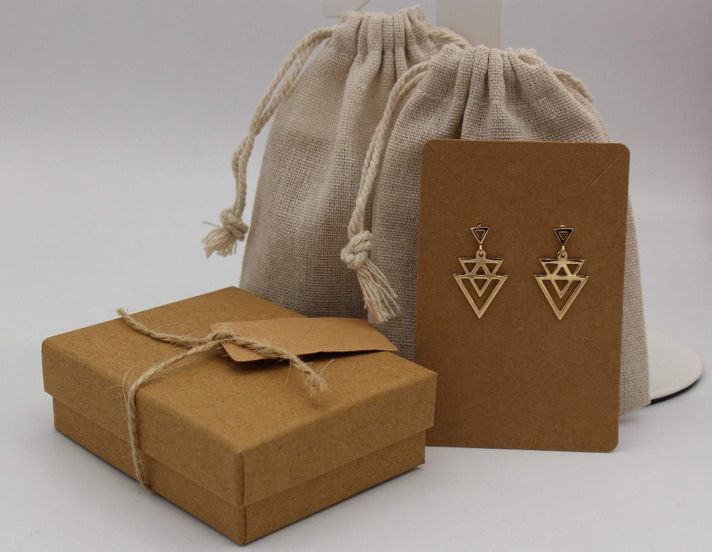 Emballage des bijoux, boite et pochon en tissu